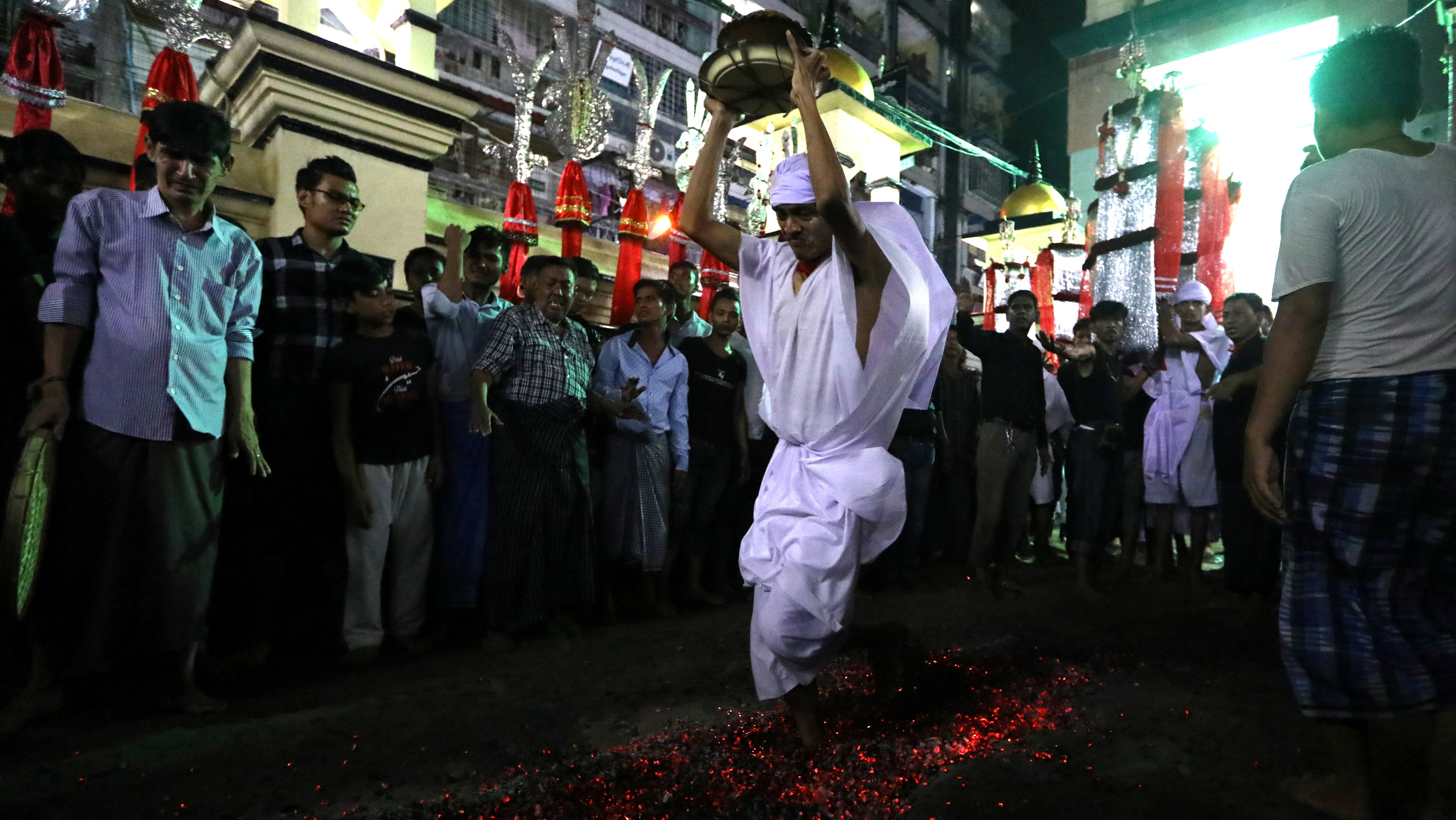 Shia Muslims mark Ashura with mourning processions and self ...